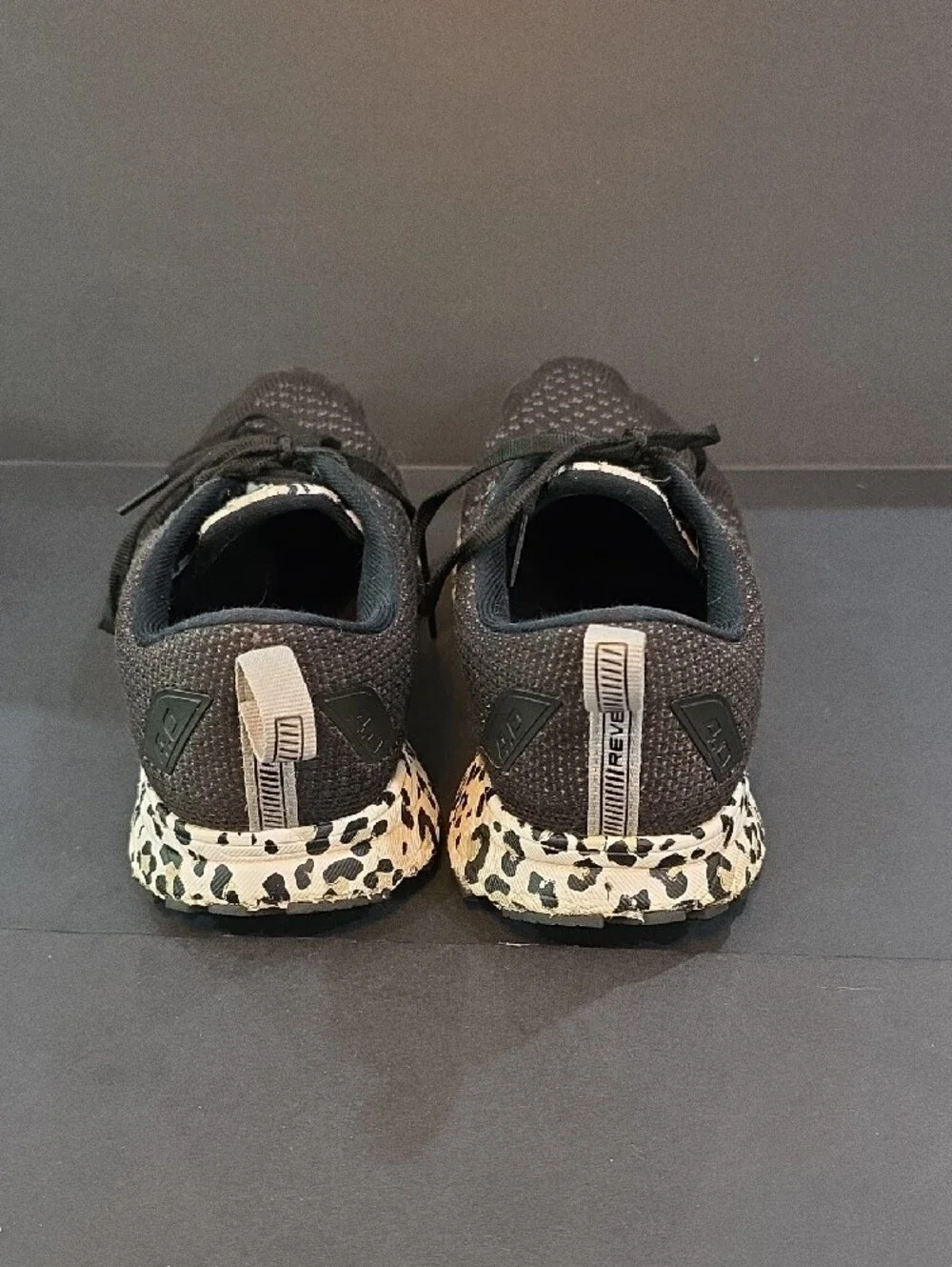 Brooks Revel 4 Women's Black Knit Shoes with Leopard-Print Midsole Size 8.5